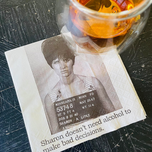 "Sharon Doesn't Need" Mugshot Paper Cocktail Napkins (20 pk)